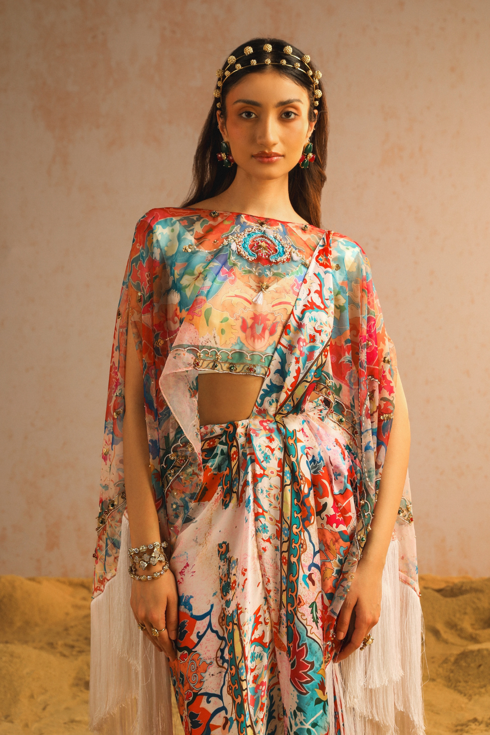 Ivory draped saree with blouse and cape