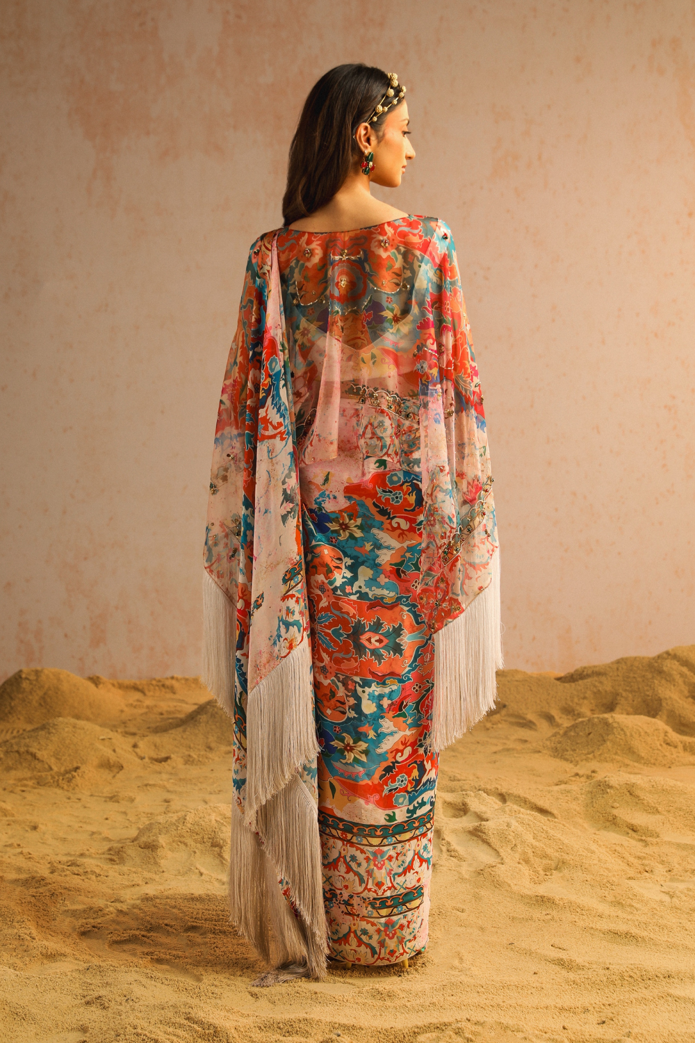 Ivory draped saree with blouse and cape