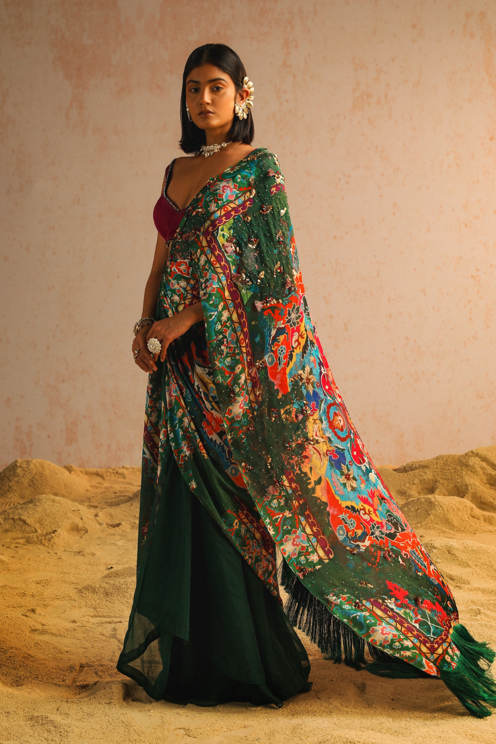 Green draped saree with purple blouse