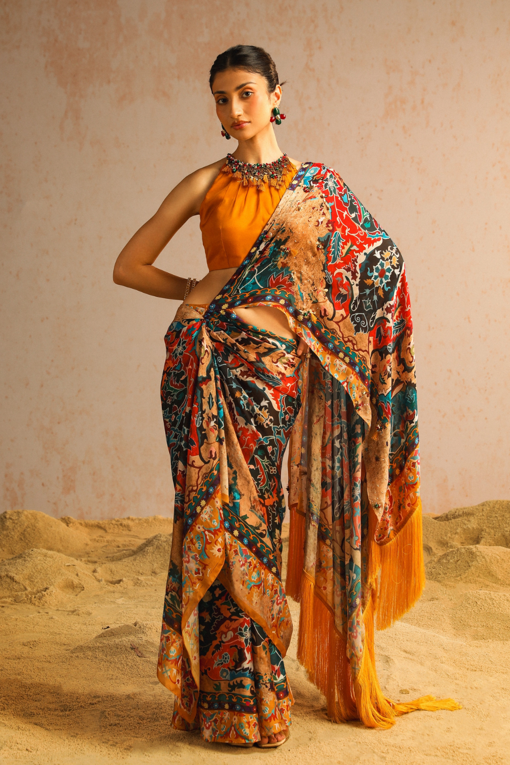 Mustard yellow draped saree with halter neck blouse