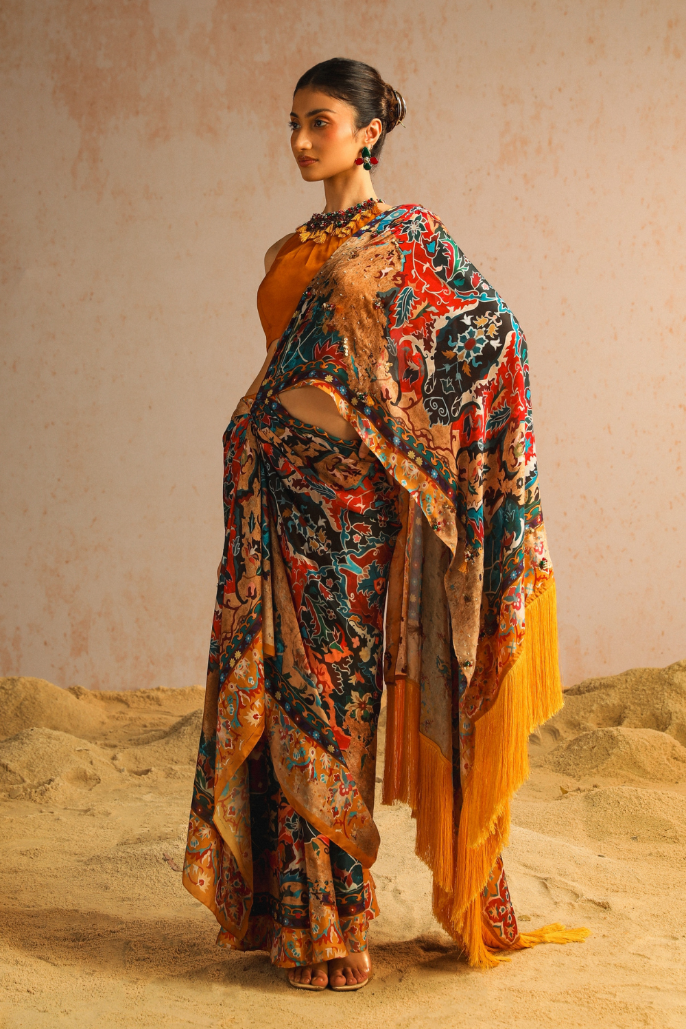 Mustard yellow draped saree with halter neck blouse