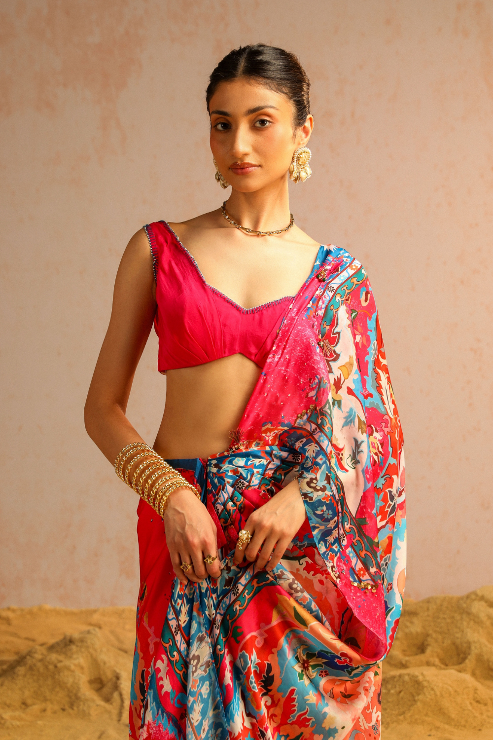 Hot pink draped saree with blouse