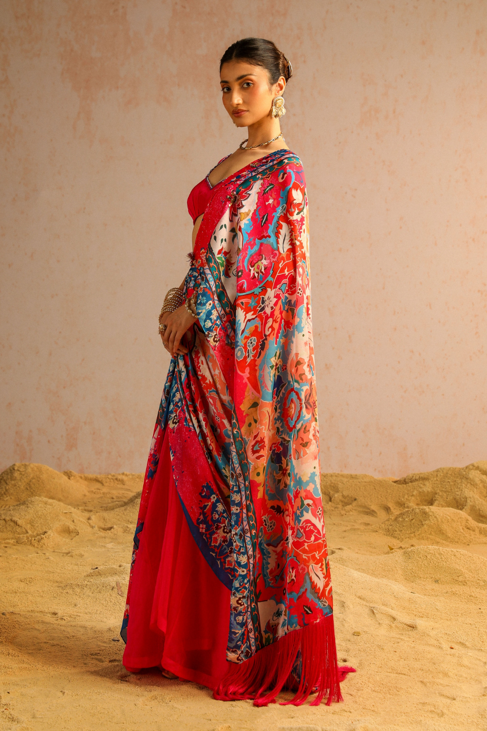 Hot pink draped saree with blouse