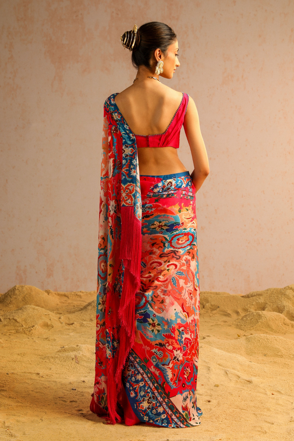 Hot pink draped saree with blouse