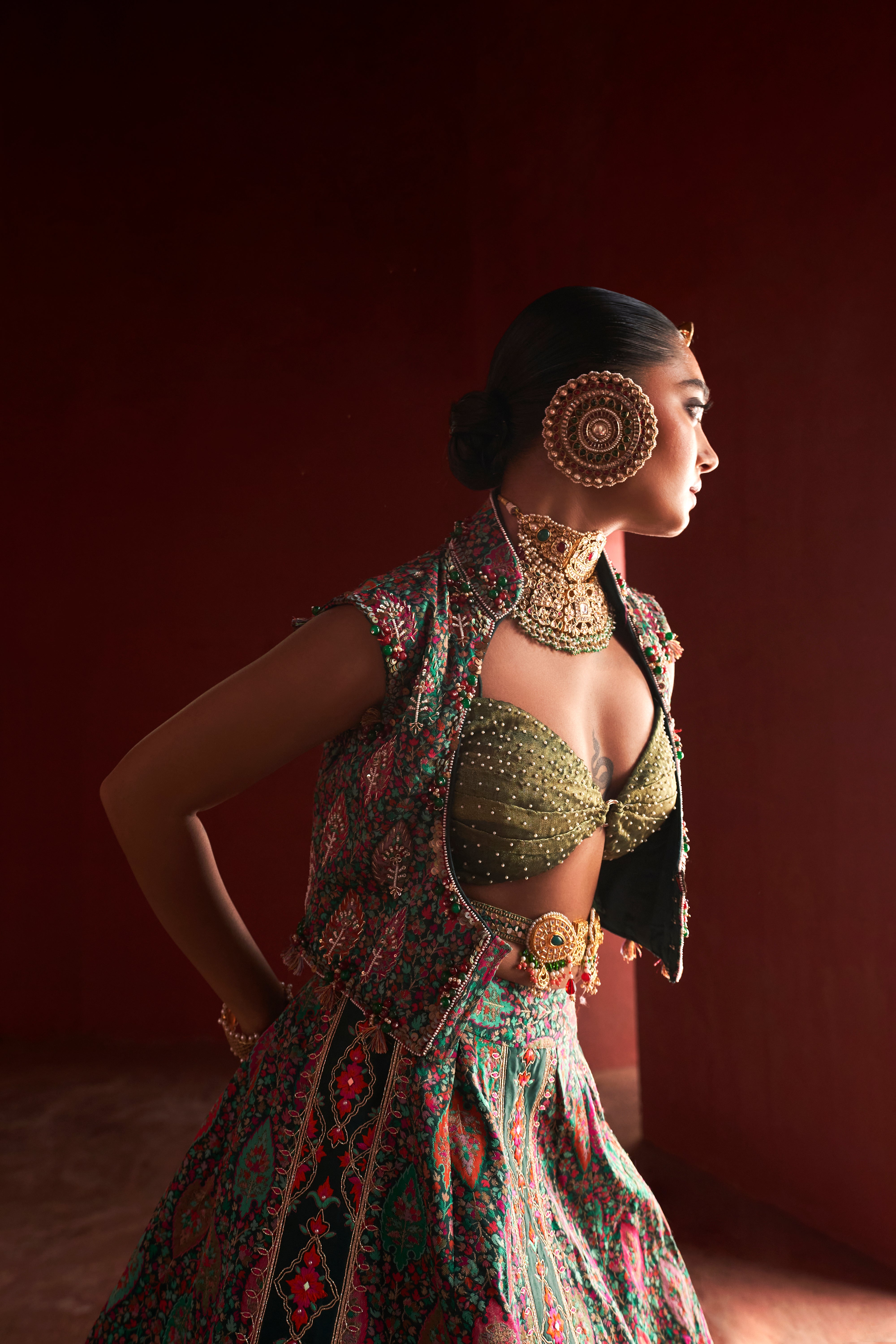 Dark Green Jamawar lehnga with Jacket