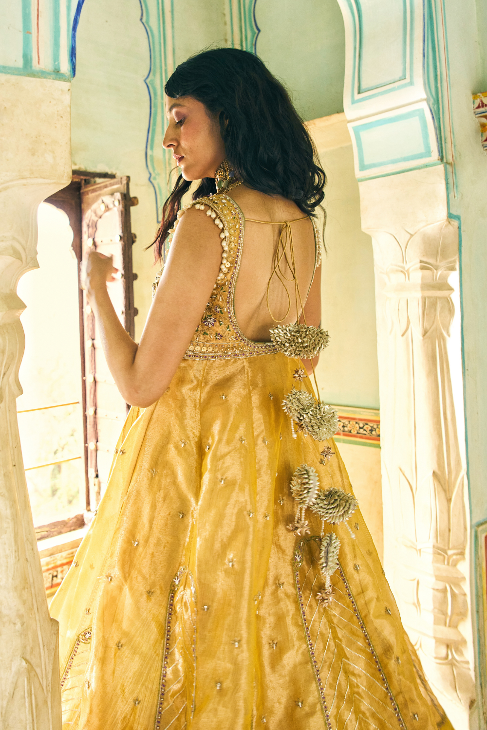 Sukhneet Wadhwa in our Mustard yellow zari tissue jacket with crushed skirt set