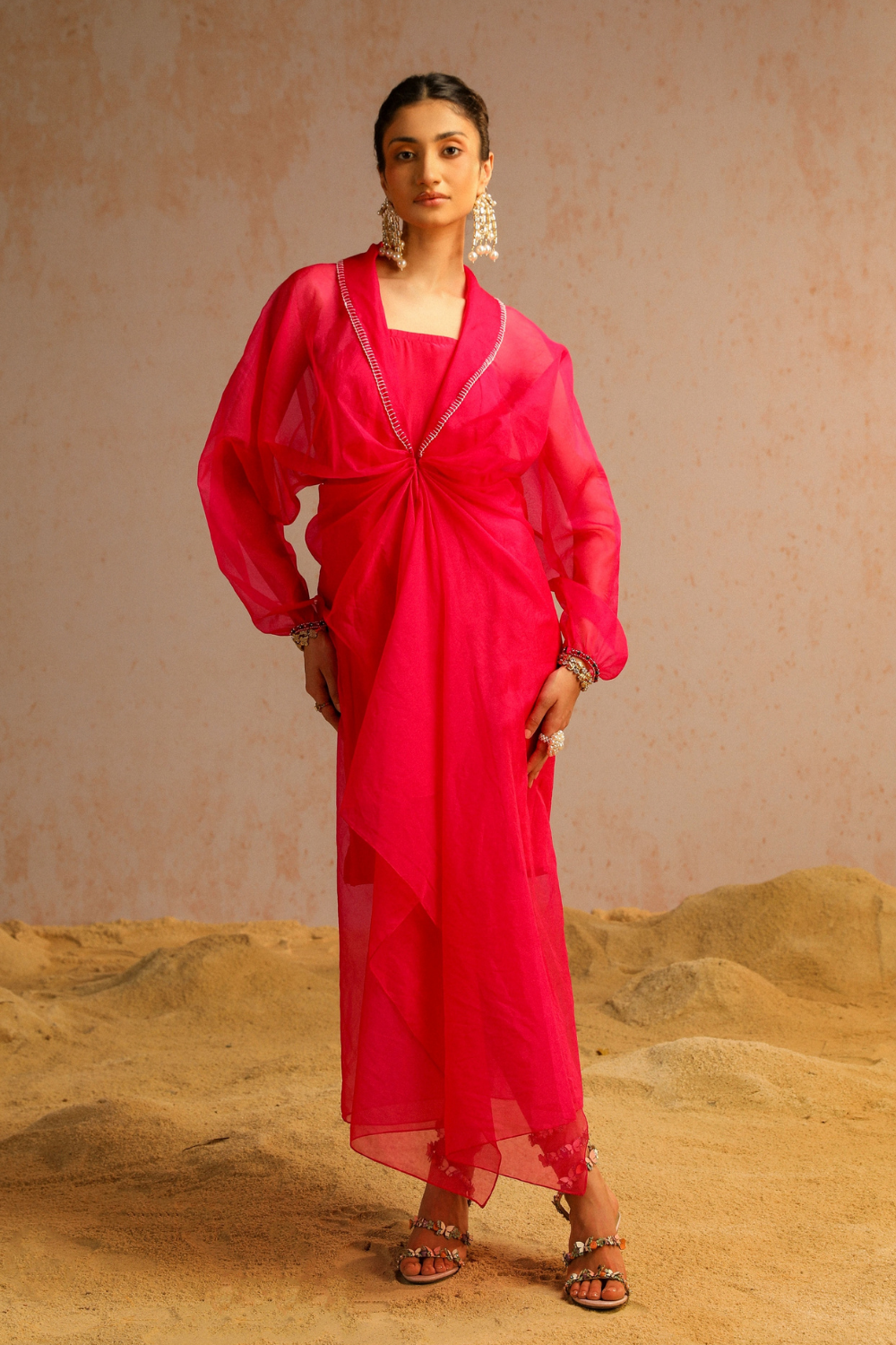 Hot pink cape with spaghetti