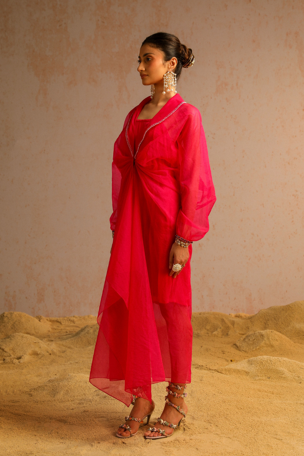 Hot pink cape with spaghetti
