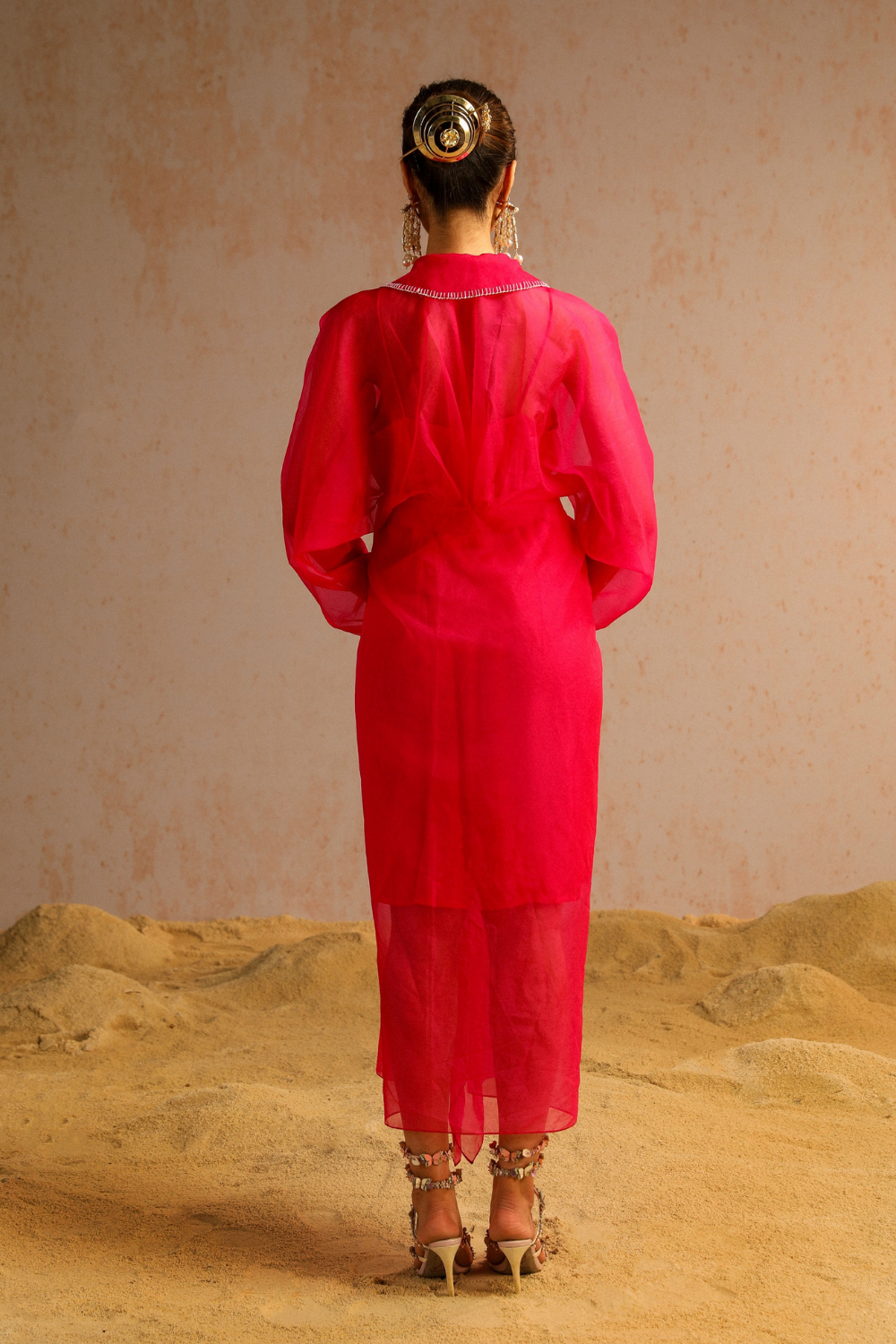 Hot pink cape with spaghetti