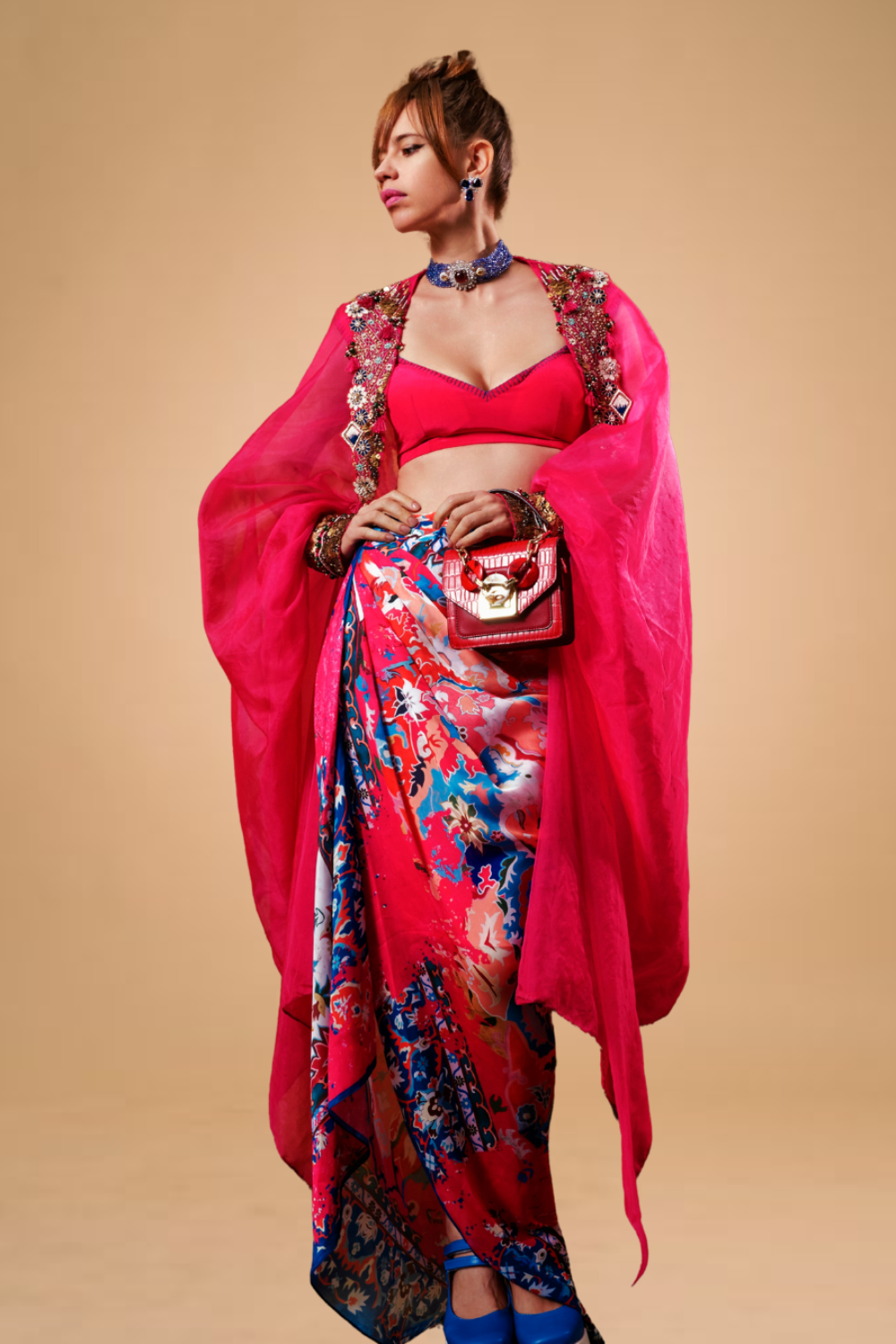 Kalki Koechlin in Hot pink draped skirt with blouse & cape