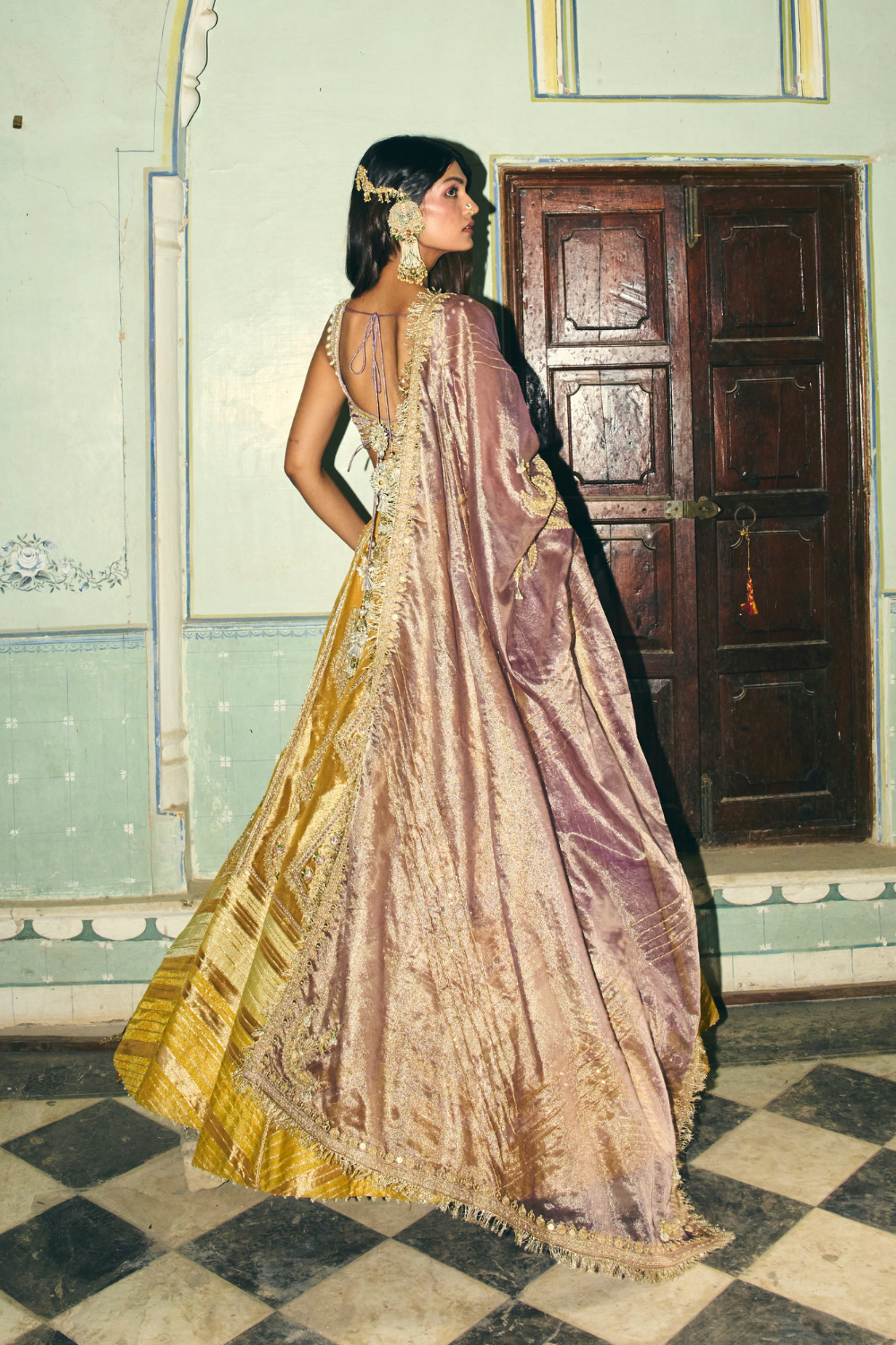 Saiee Manjrekar in our Mustard yellow with lilac tissue dupatta lehenga set