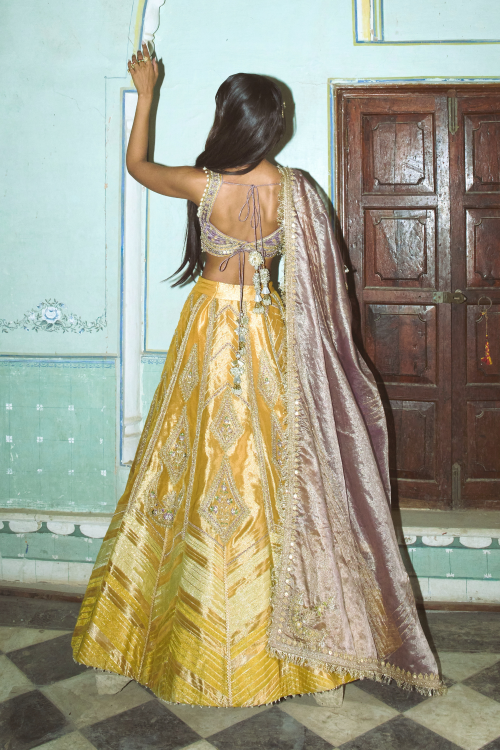 Saiee Manjrekar in our Mustard yellow with lilac tissue dupatta lehenga set