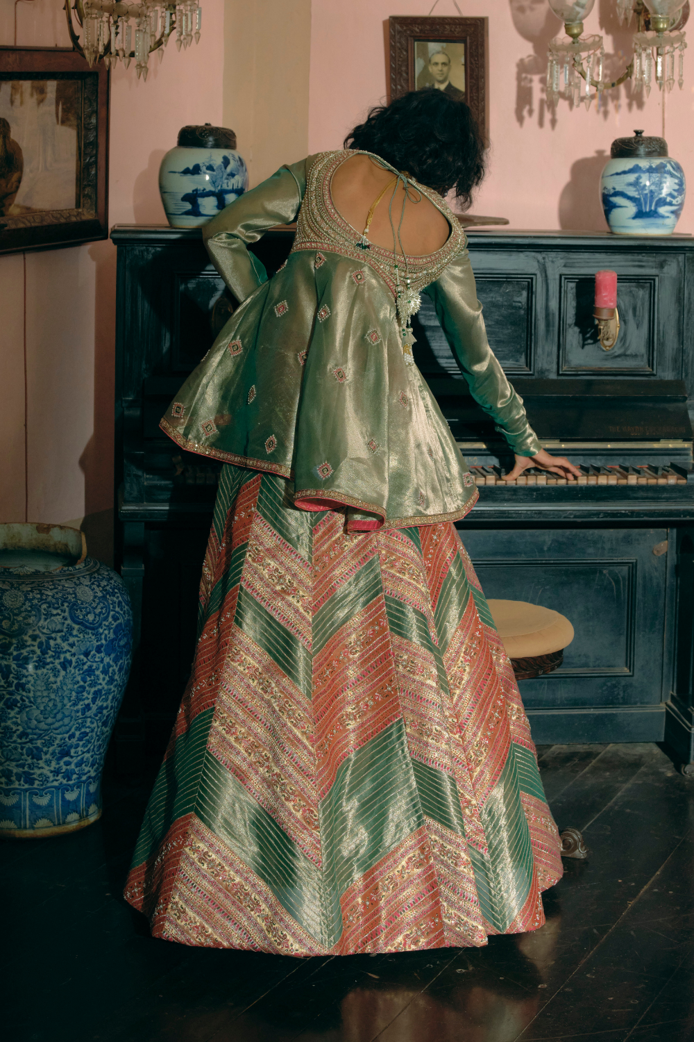 Kompal Matta Kapoor Emerald Green silk zari tissue peplum top with skirt and dupatta set