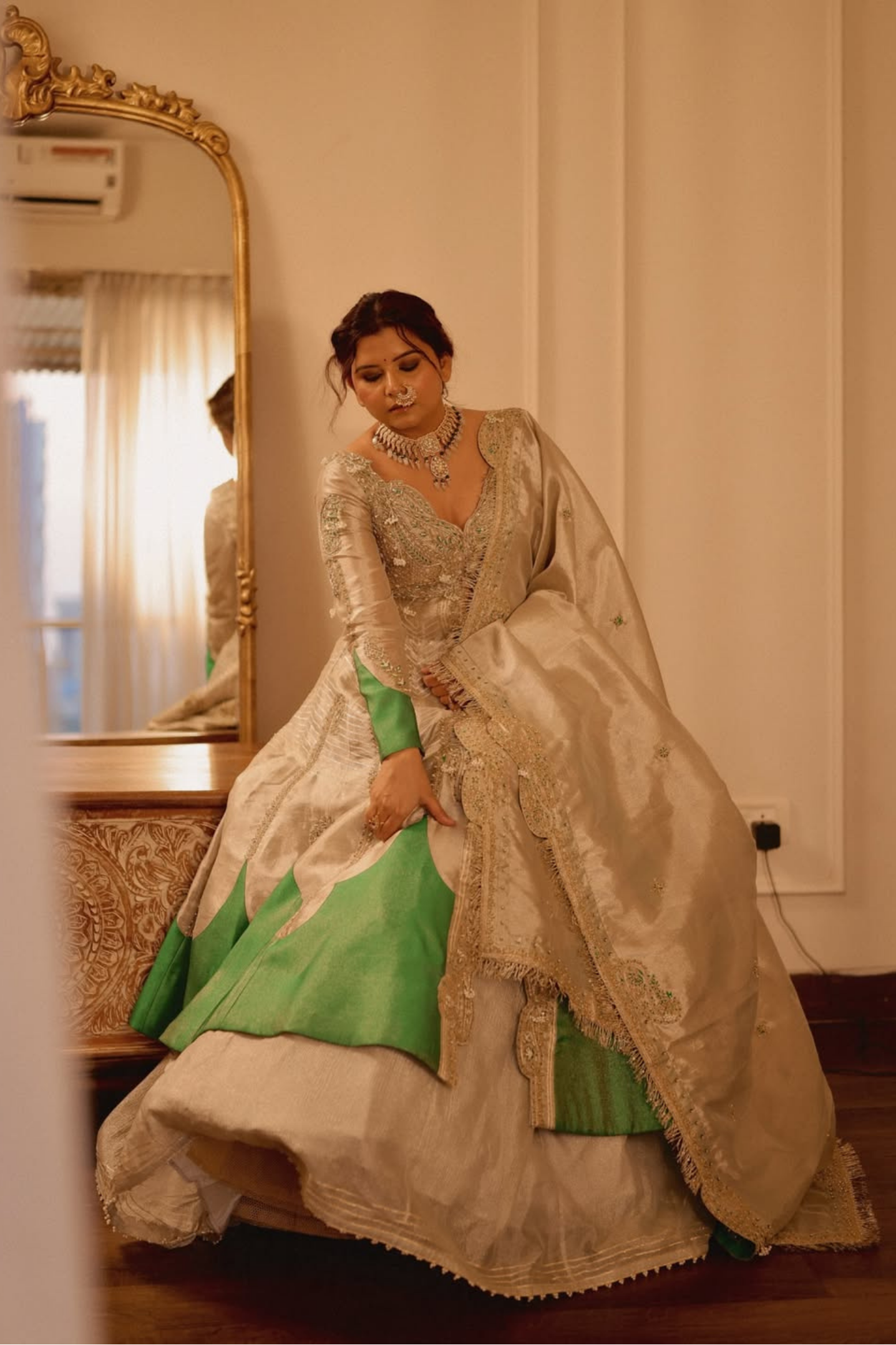 Anandhika in our Pearl gold silk zari tissue jacket with skirt set
