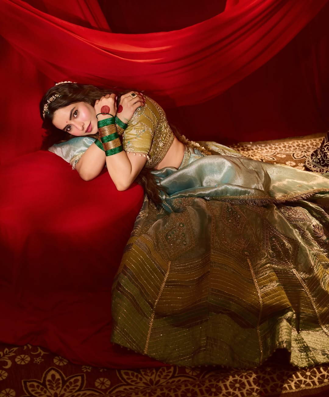 Ammna Sharif in our Ice blue silk zari tissue lehenga with olive bloom dupatta