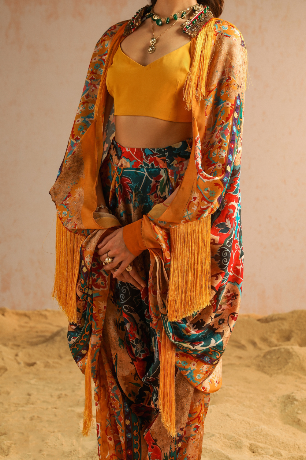 Yellow harem pants with blouse and cape