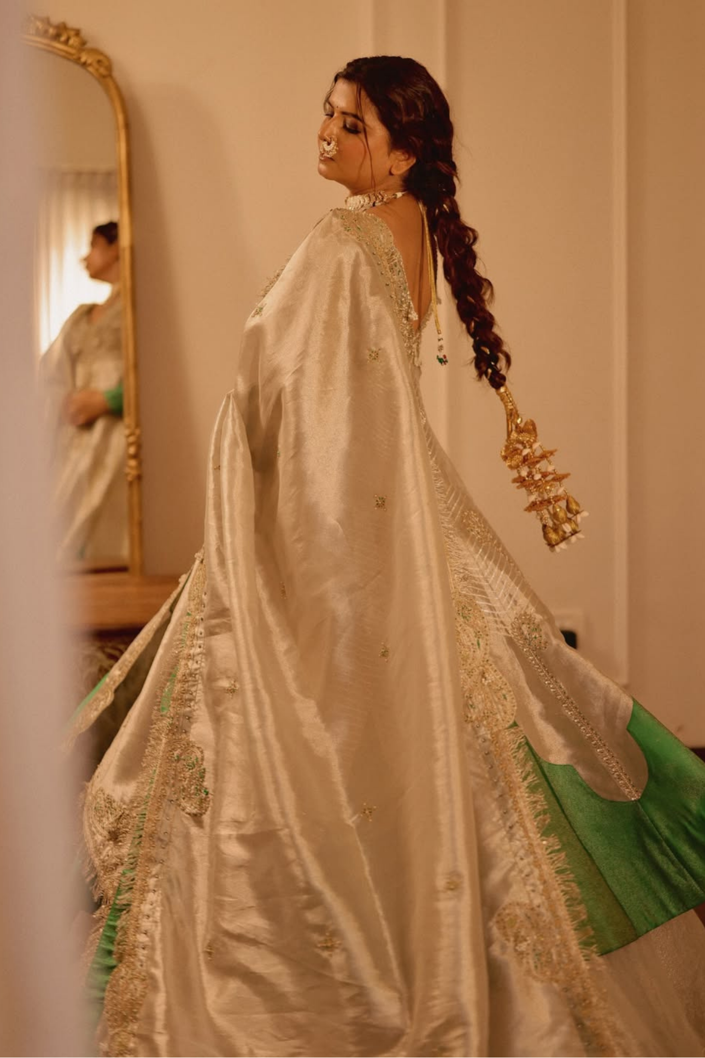 Anandhika in our Pearl gold silk zari tissue jacket with skirt set