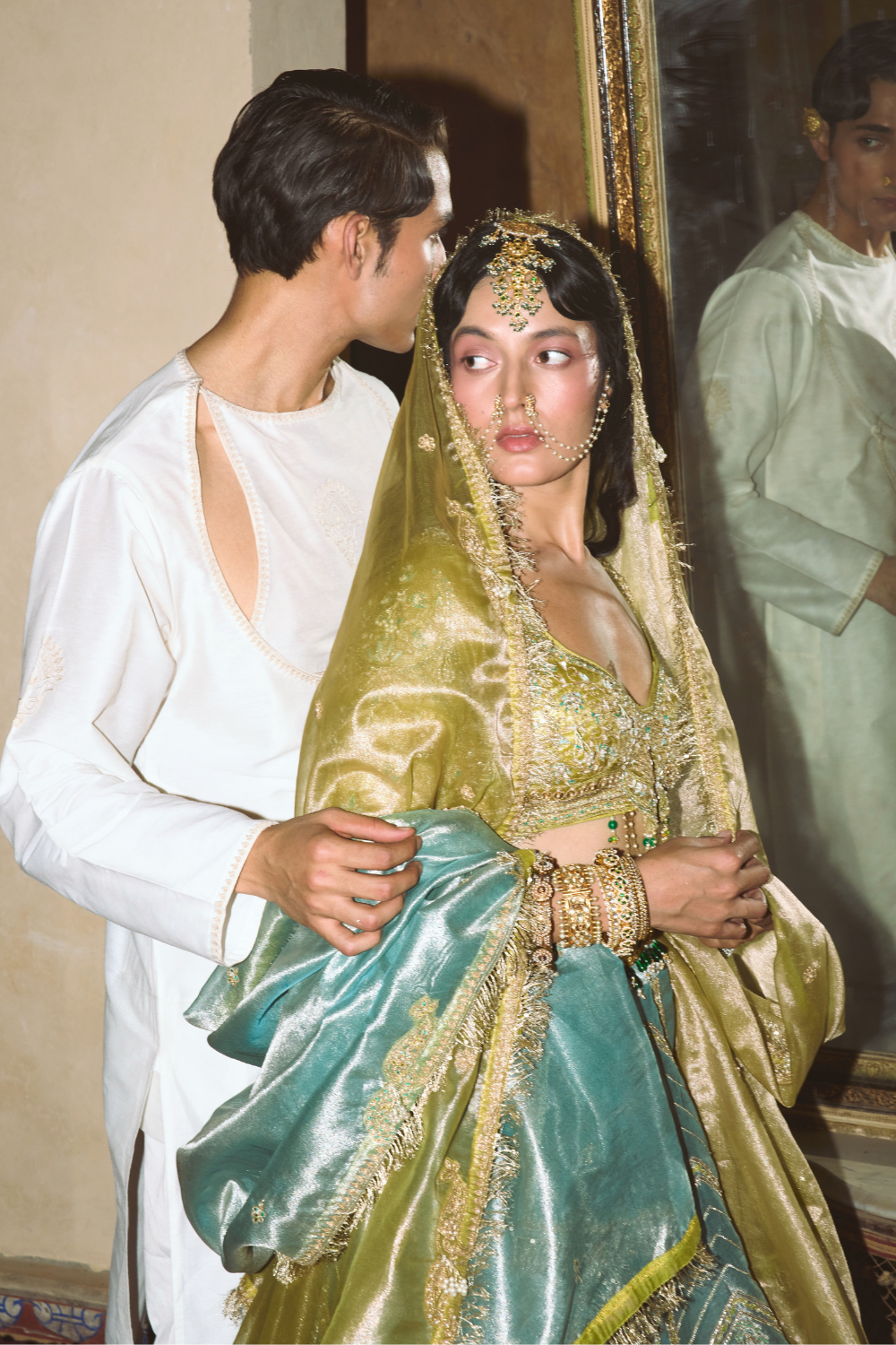 Ice blue silk zari tissue lehenga with olive bloom dupatta