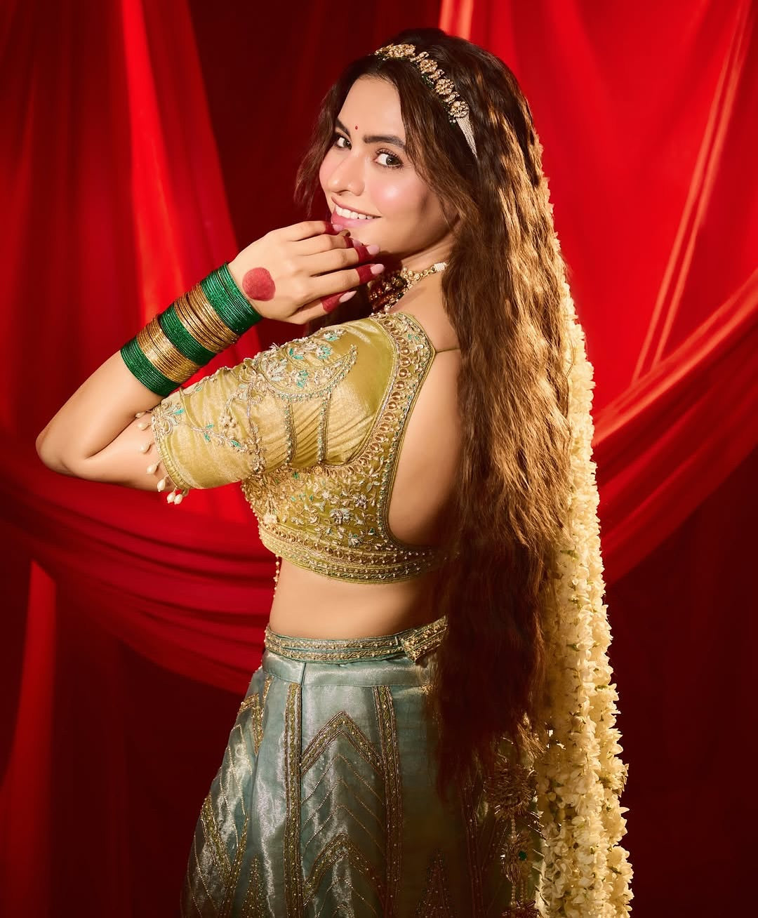 Ammna Sharif in our Ice blue silk zari tissue lehenga with olive bloom dupatta