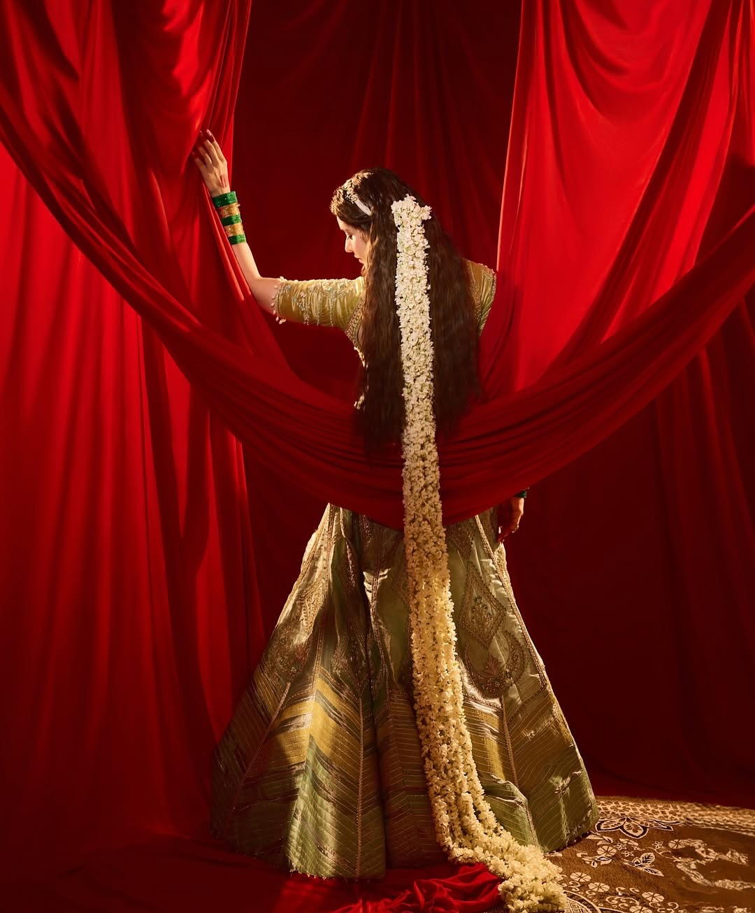 Ammna Sharif in our Ice blue silk zari tissue lehenga with olive bloom dupatta