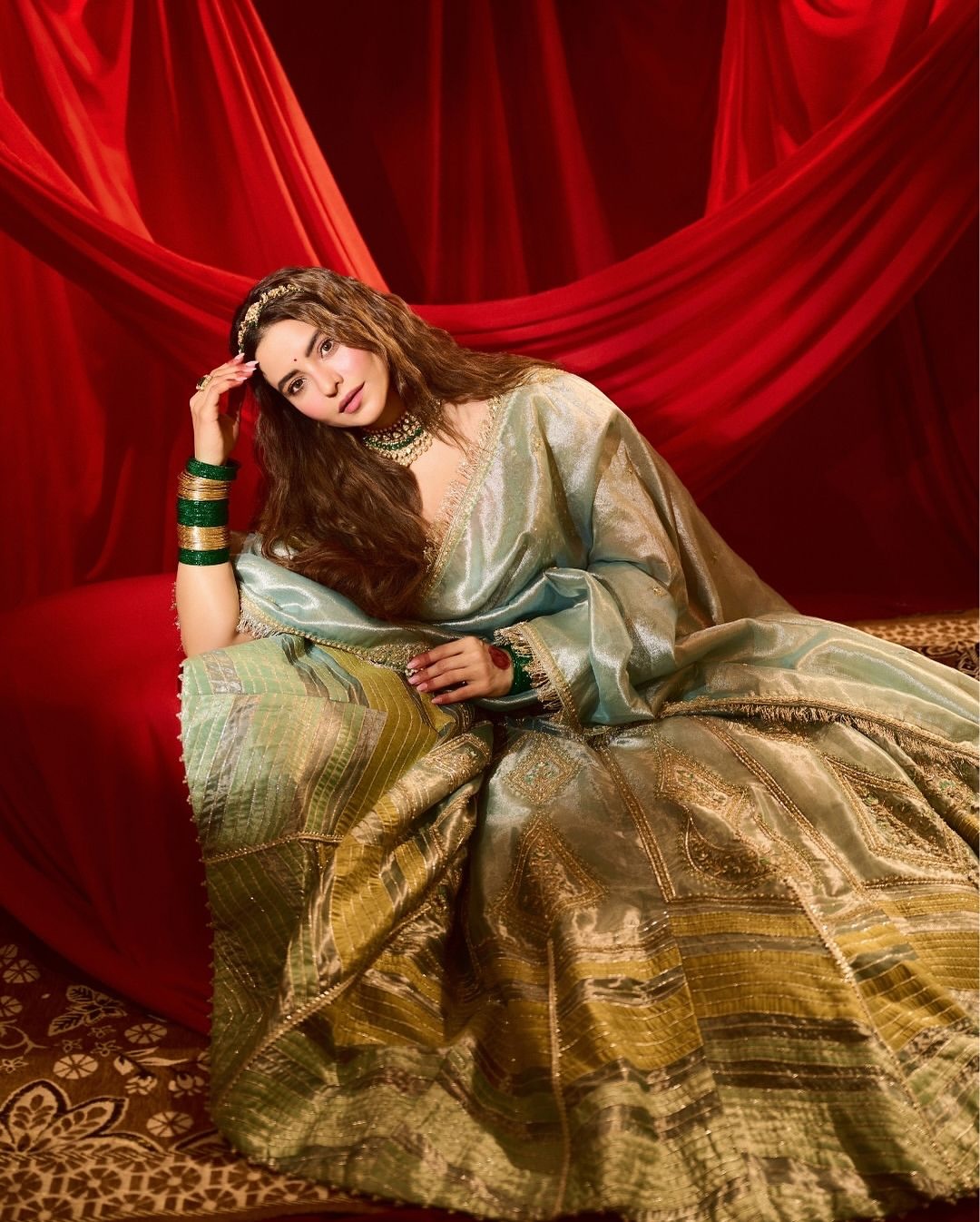 Ammna Sharif in our Ice blue silk zari tissue lehenga with olive bloom dupatta