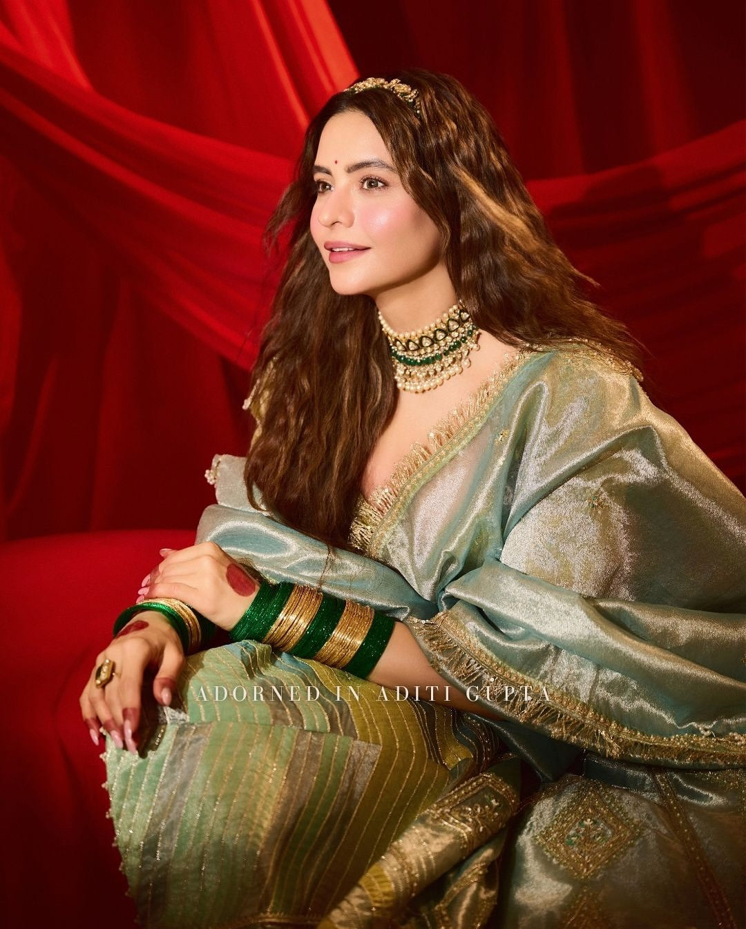 Ammna Sharif in our Ice blue silk zari tissue lehenga with olive bloom dupatta