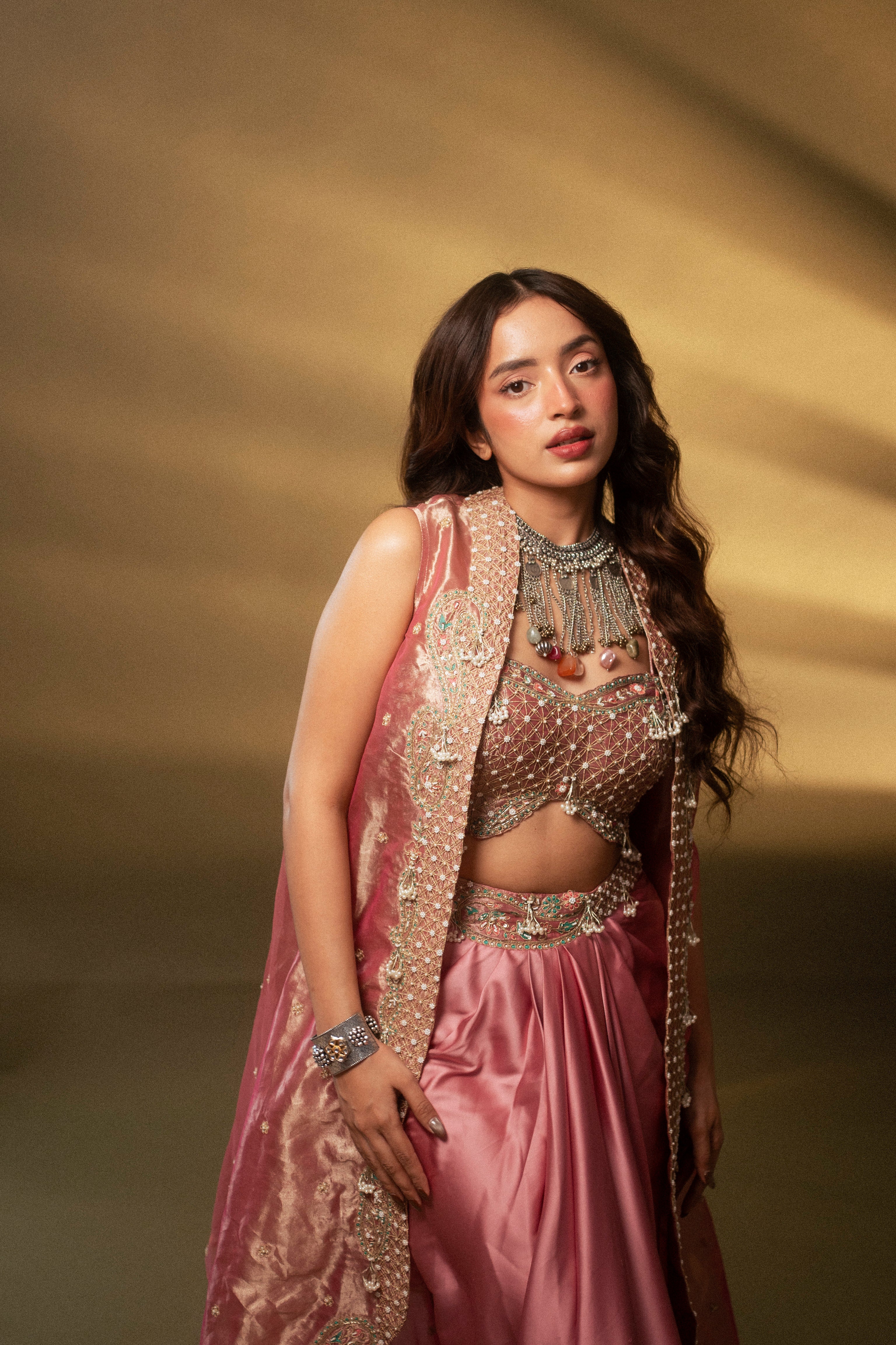 Diksha Rawat in our Blush pink drape satin skirt set with cape